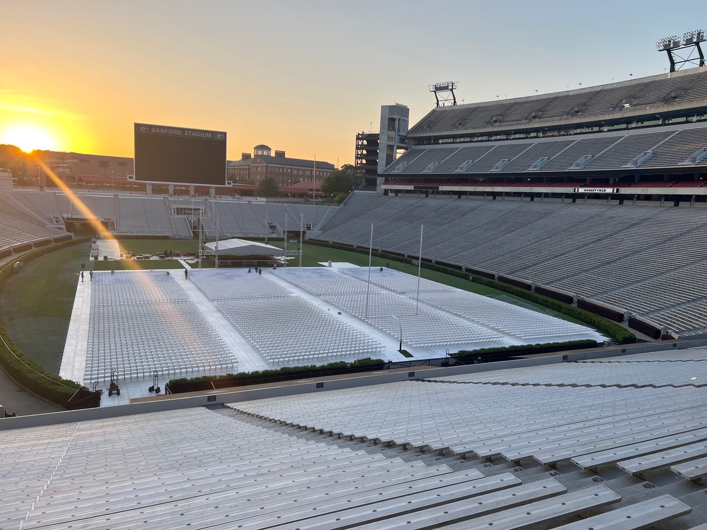 Field flooring and ceremony seating set up on Dooley Field at Sanford Stadium in Athens, GA
